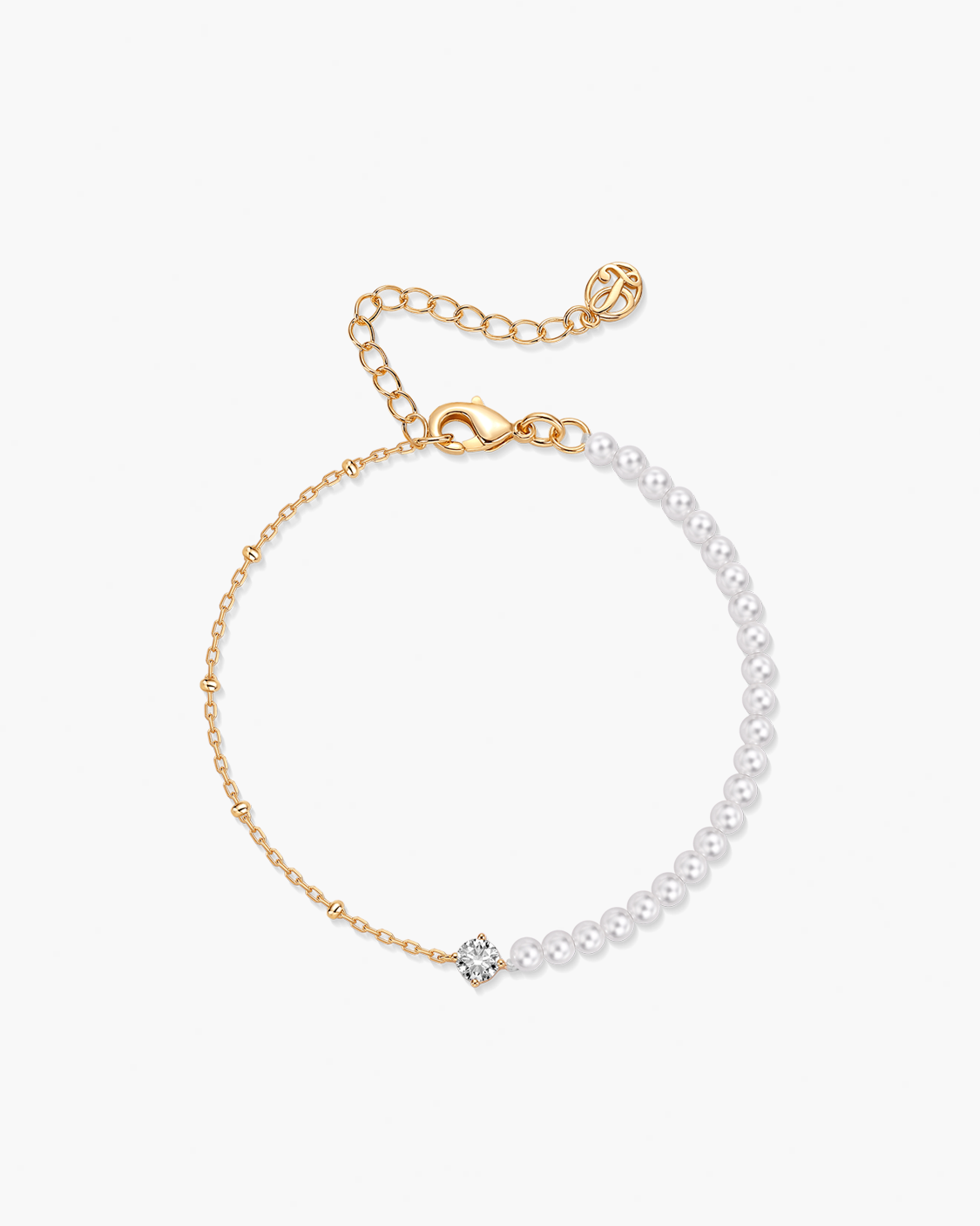 Gold and pearl bracelet on a white background