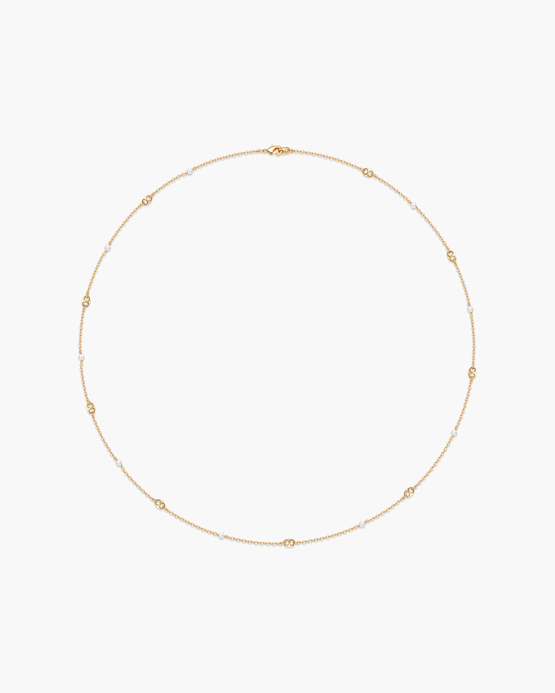 Gold necklace on a white background