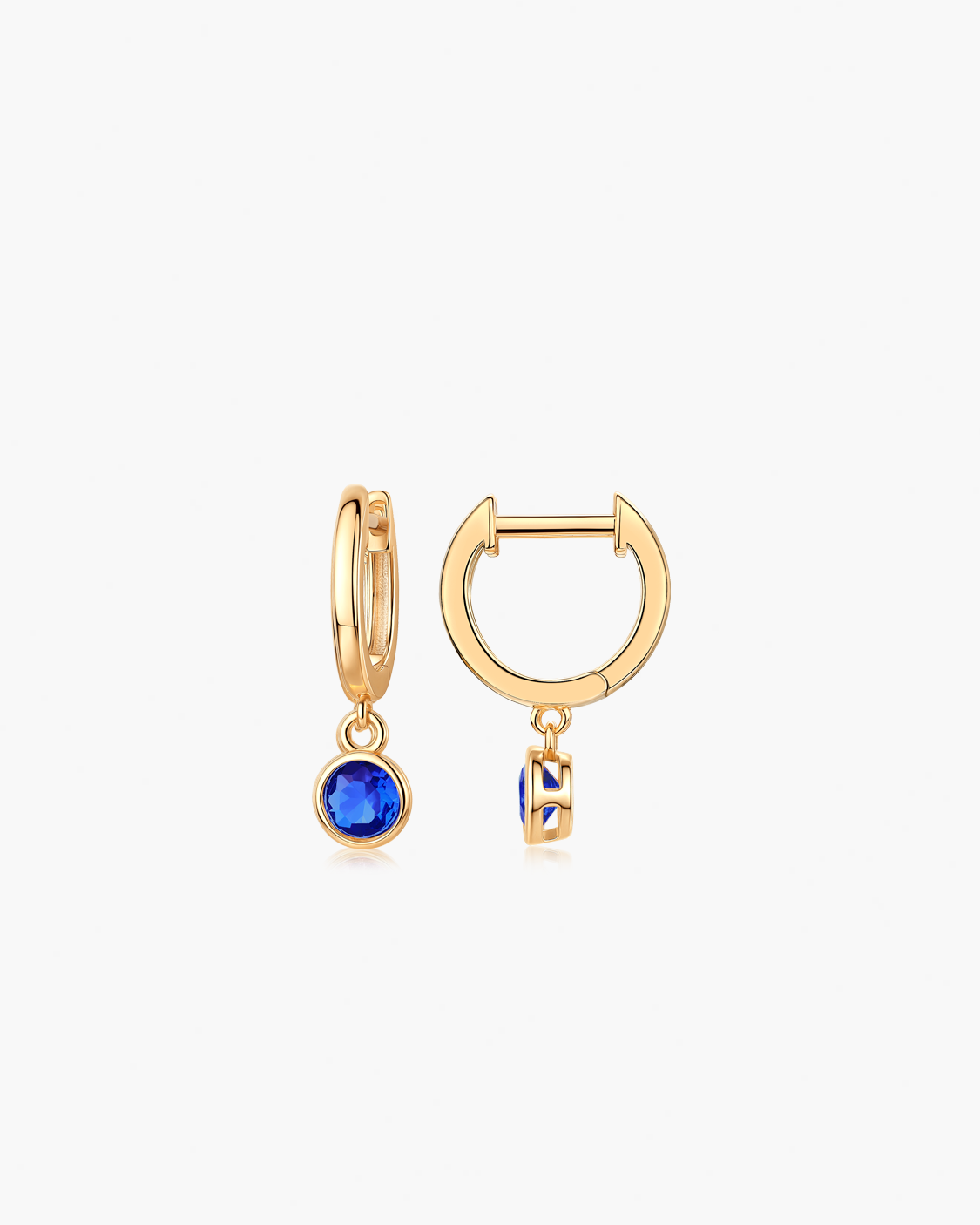 Gold hoop earrings with blue gemstones 