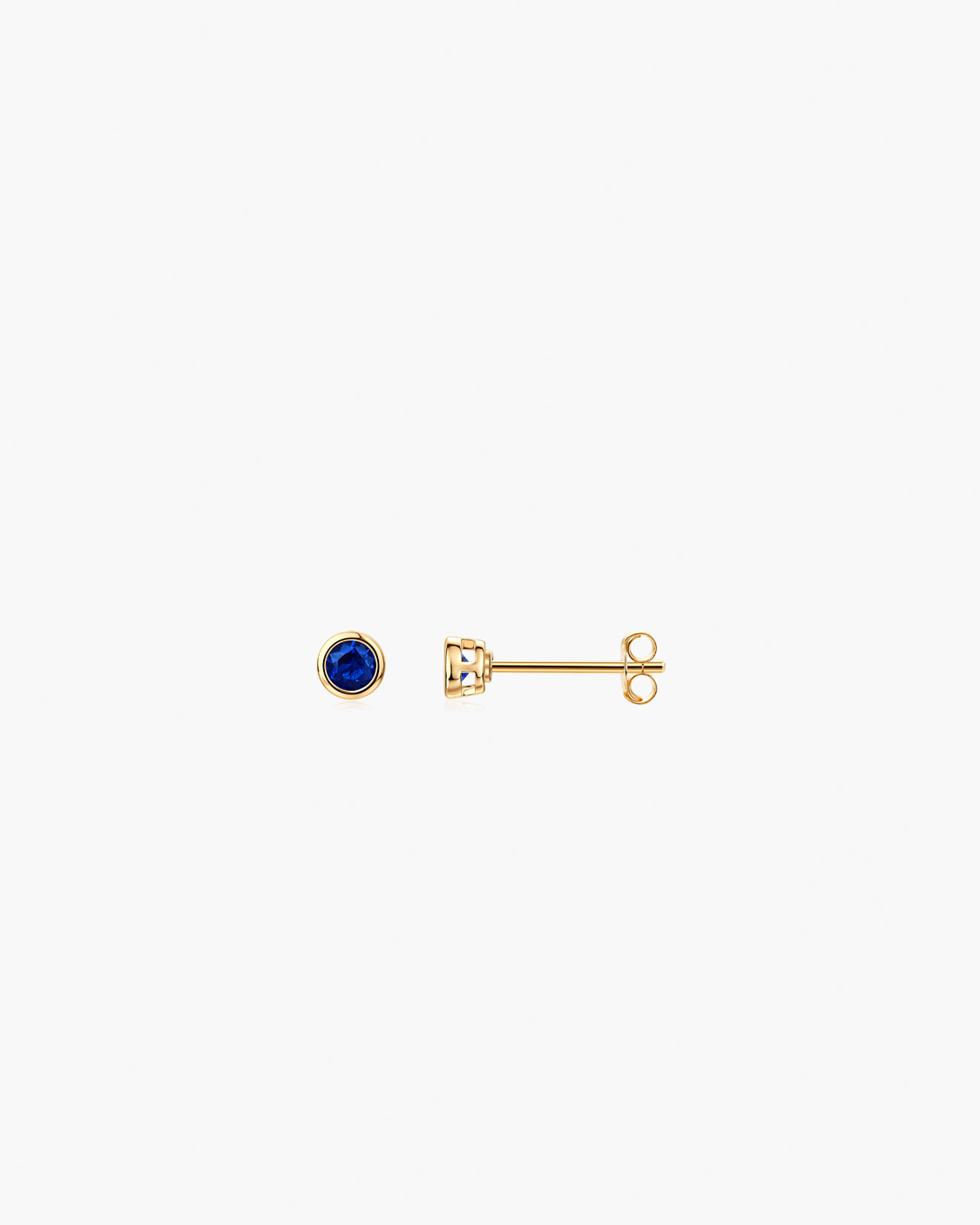 Gold earrings with a blue gemstone 