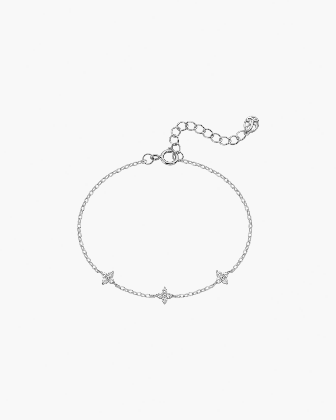 Silver bracelet with star-shaped charms on a light gray background
