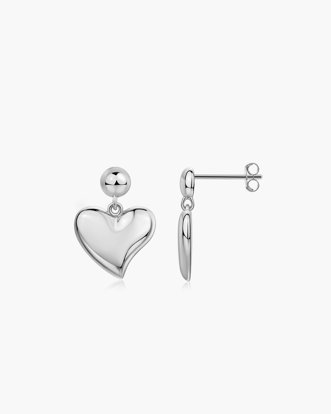 Silver heart-shaped earrings on a white background