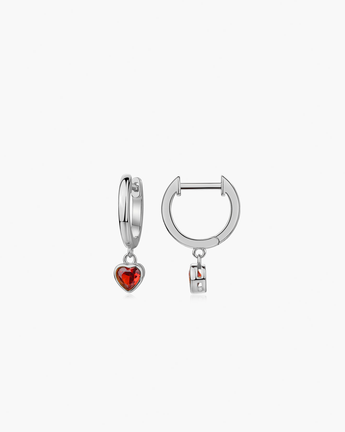 Silver hoop earrings with red heart charms on a white background