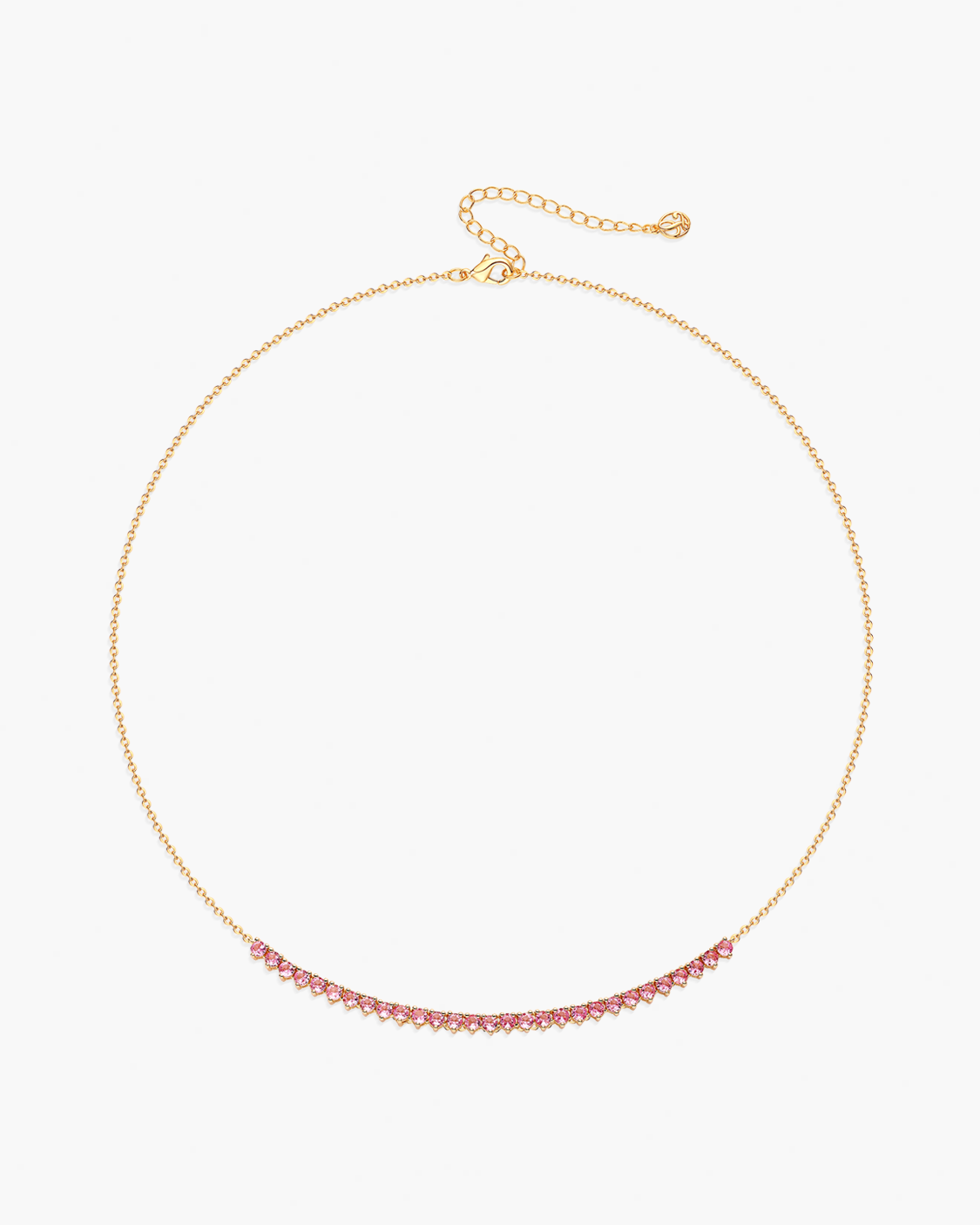 Gold necklace with pink beads on a white background