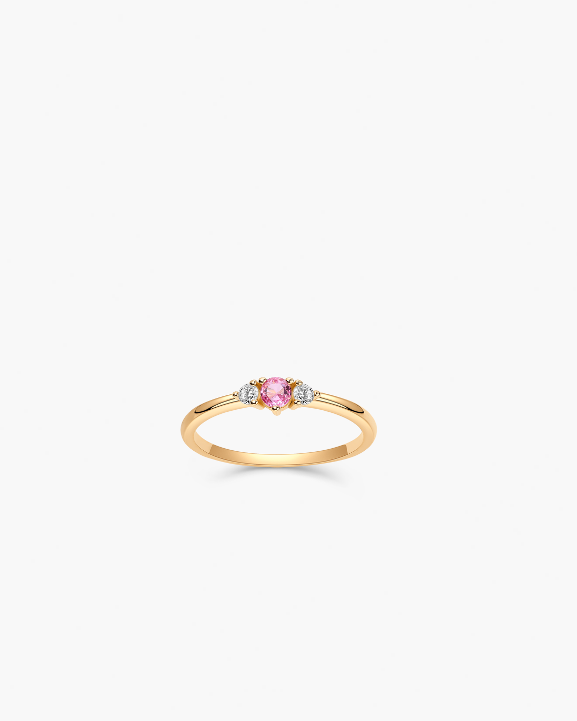 Gold ring with a pink gemstone 