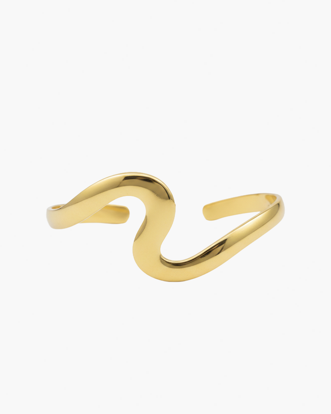 Gold s shaped arm cuff on a white background
