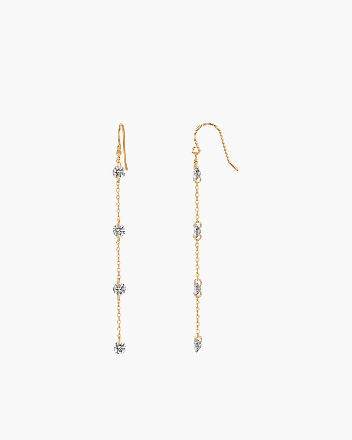 Gold chain earrings with small diamond-like beads on a white background