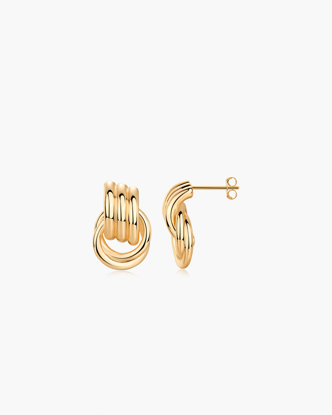 Gold hoop earrings on a white background