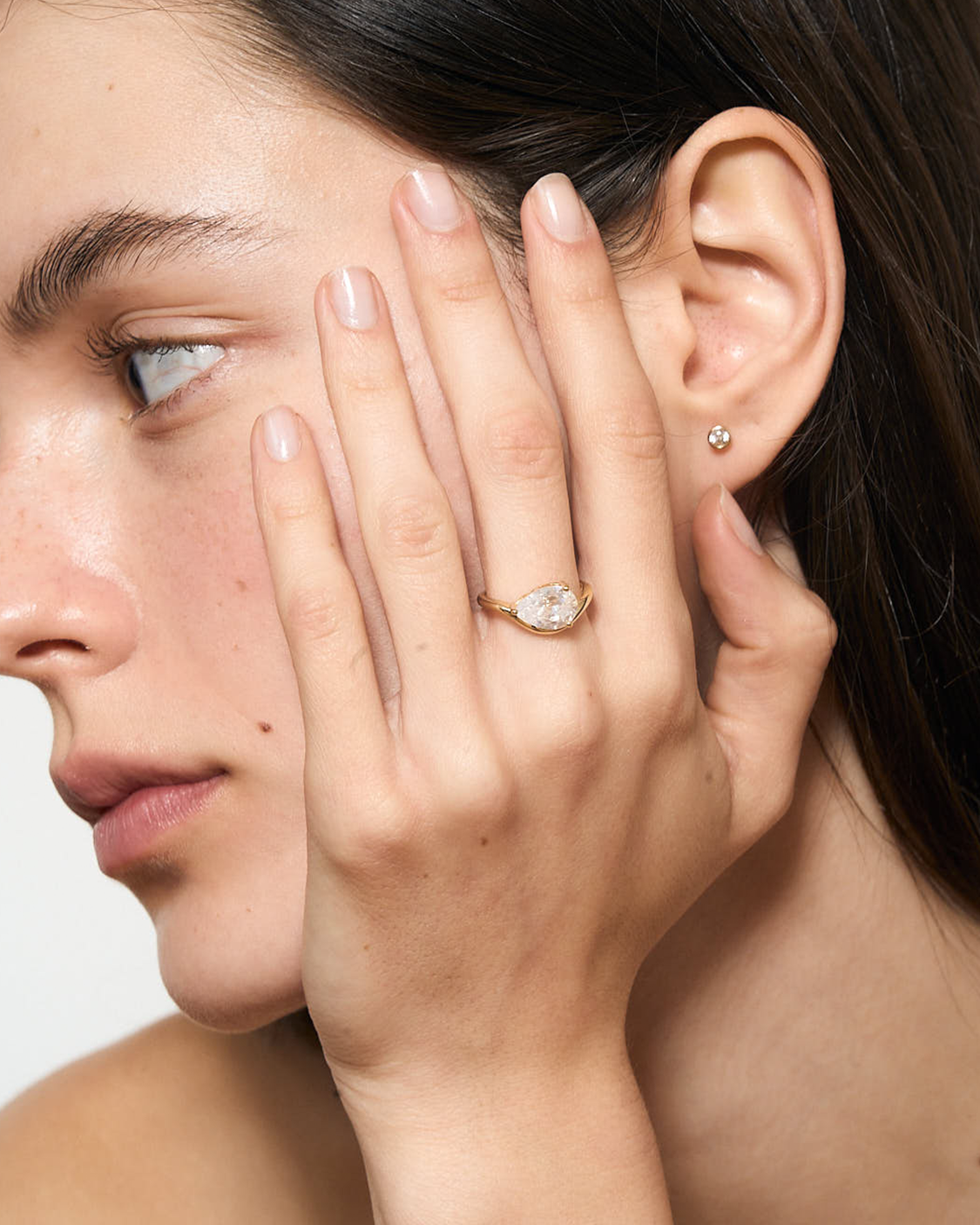 white bezel stud on model