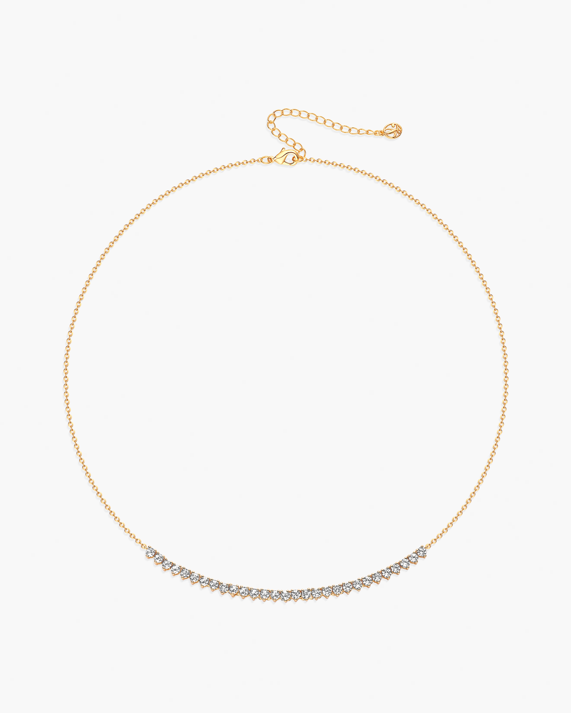 Gold necklace with small diamonds on a white background