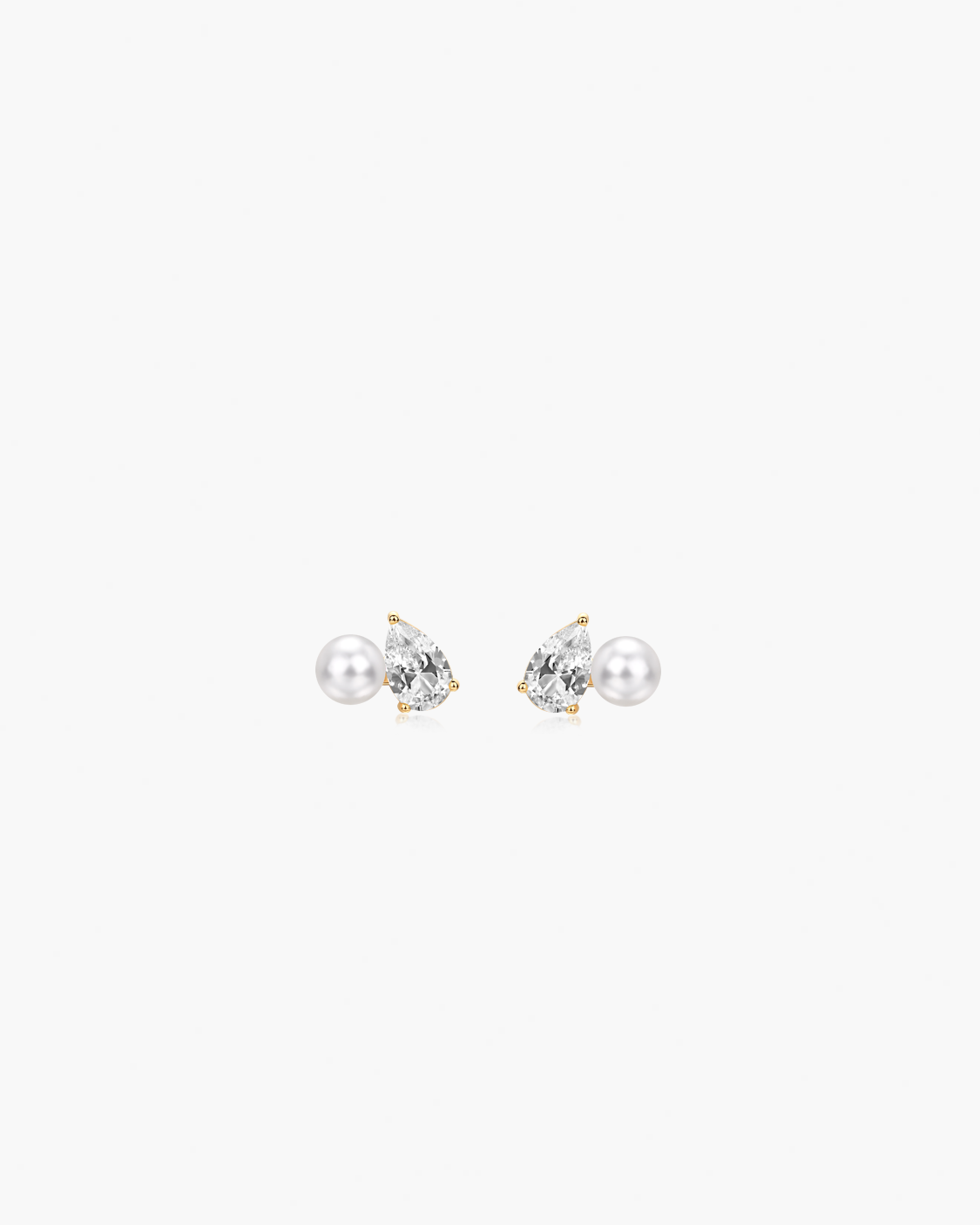 Pair of pearl earrings on a white background