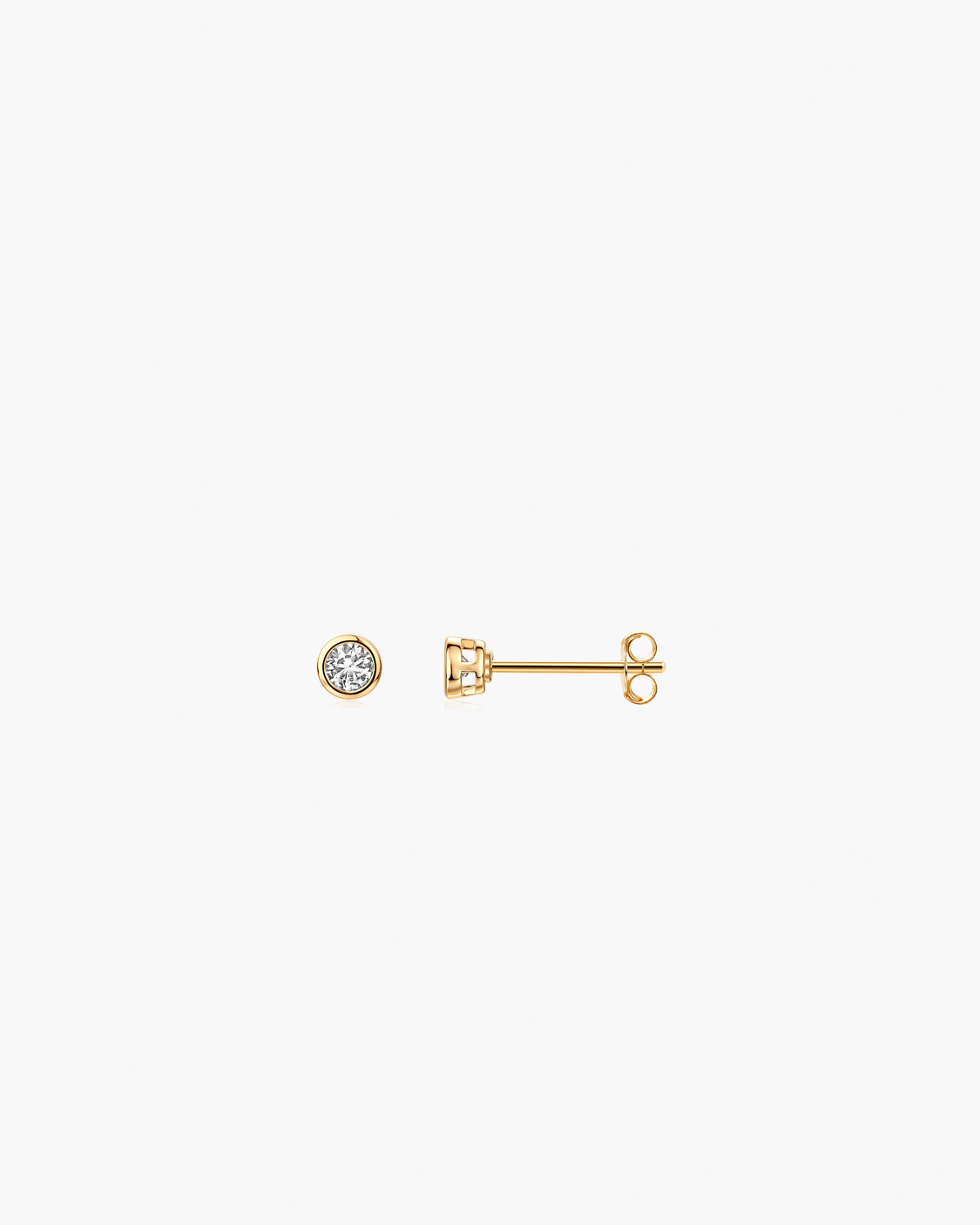 Gold earrings with a white gemstone 